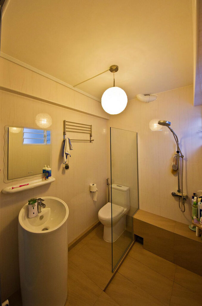 Bright bathroom with globe chandelier