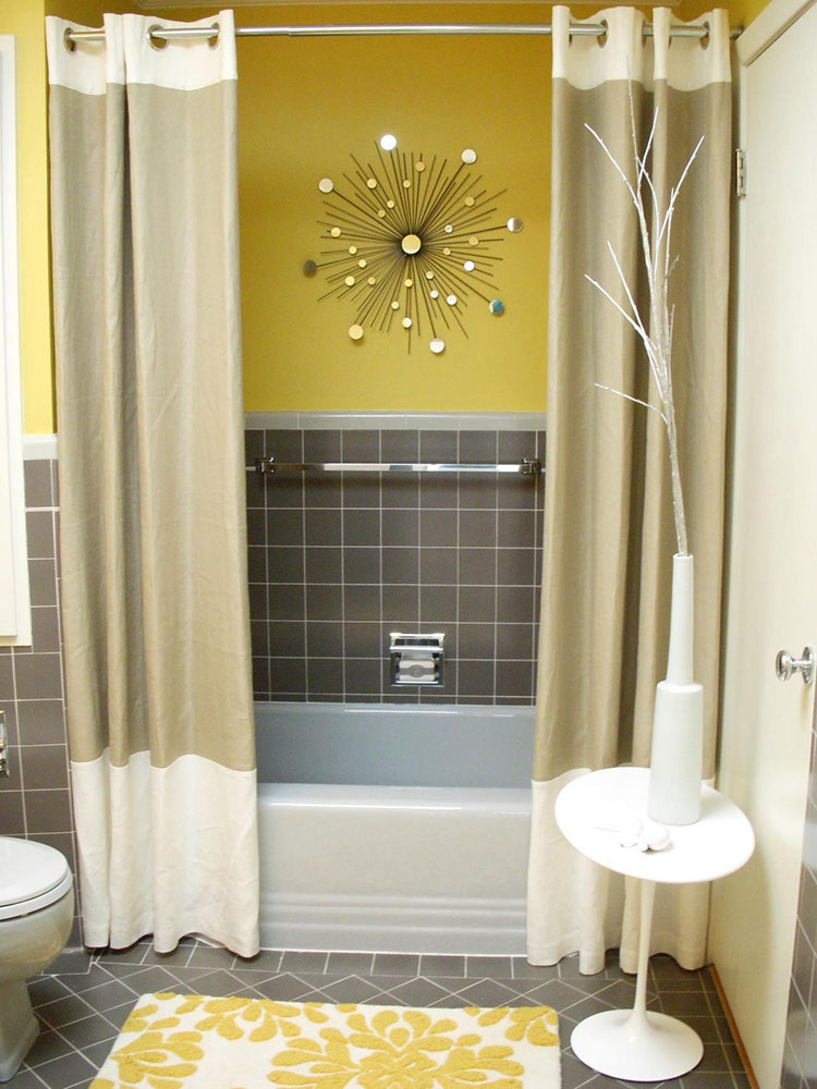 Yellow bathroom with grey blocked tiles